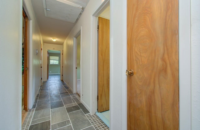 corridor with baseboards