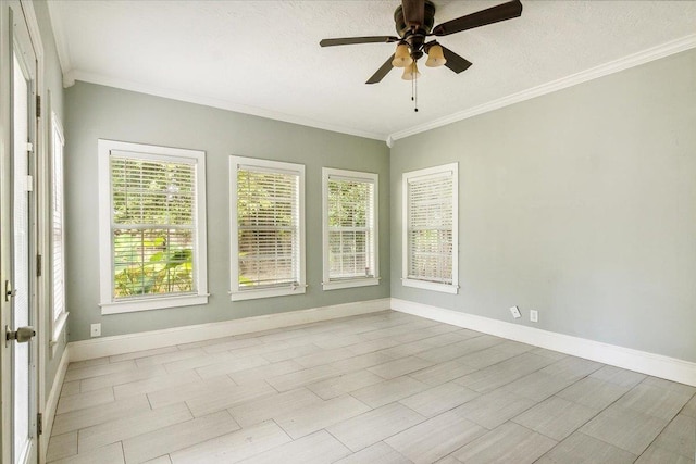 unfurnished sunroom with ceiling fan