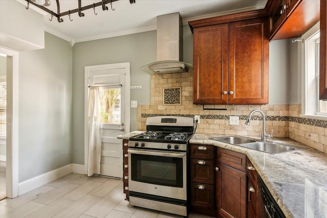 kitchen featuring sink, wall chimney exhaust hood, stainless steel gas stove, light stone countertops, and tasteful backsplash