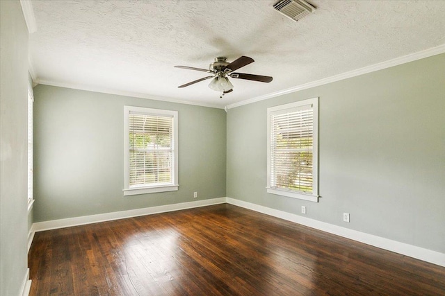 spare room with ceiling fan, dark wood-type flooring, and ornamental molding