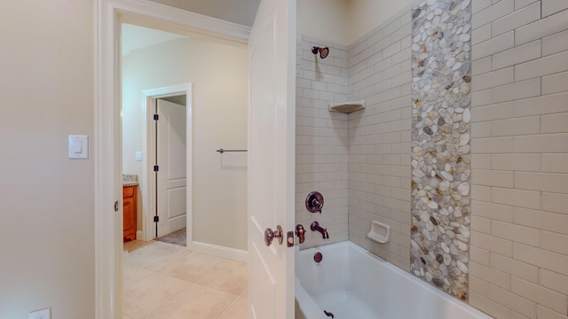 bathroom featuring tile patterned floors, vanity, and shower / bathtub combination with curtain