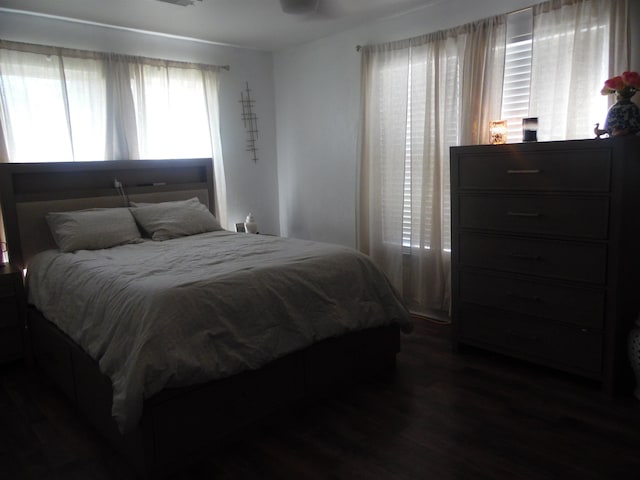 bedroom with wood finished floors