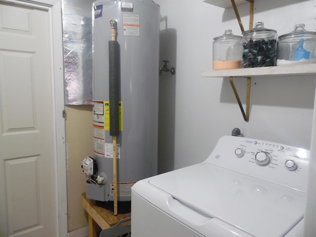 laundry room featuring washer / dryer, laundry area, and gas water heater