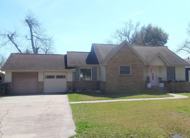 single story home with brick siding, a shingled roof, concrete driveway, an attached garage, and a front lawn