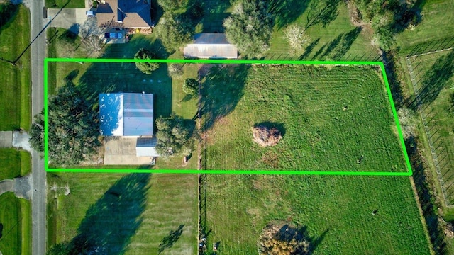 birds eye view of property featuring a rural view