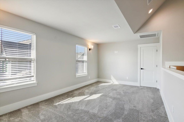 view of carpeted spare room