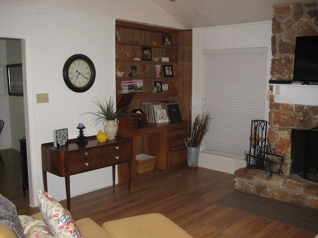 101 Locust Ln, Village Mills, TX 77663 - living area featuring lofted ceiling, a fireplace, and wood finished floors