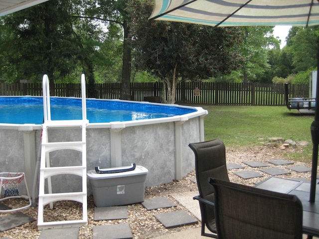 101 Locust Ln, Village Mills, TX 77663 - view of swimming pool with a fenced backyard