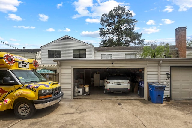 garage featuring driveway