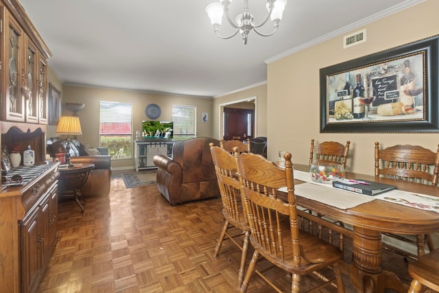 dining space featuring an inviting chandelier, ornamental molding, and visible vents