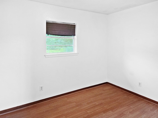 4296 W US Highway 190, Jasper, TX 75951 - empty room with wood finished floors and baseboards