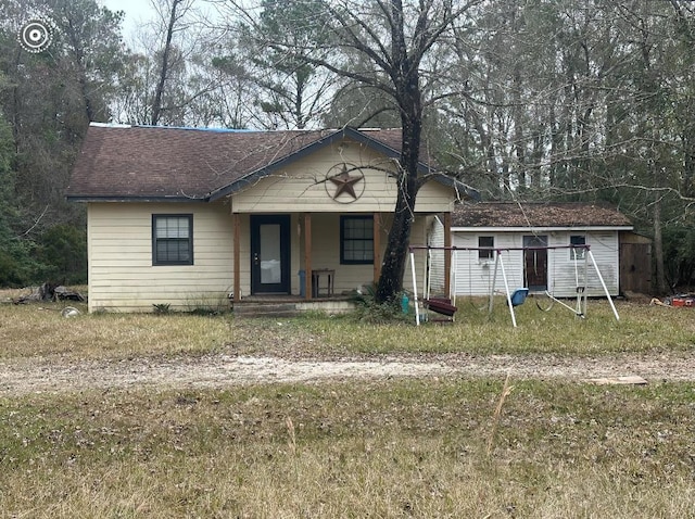 view of front of property featuring covered porch