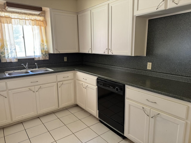 kitchen featuring dishwasher, light tile patterned floors, white cabinets, and sink