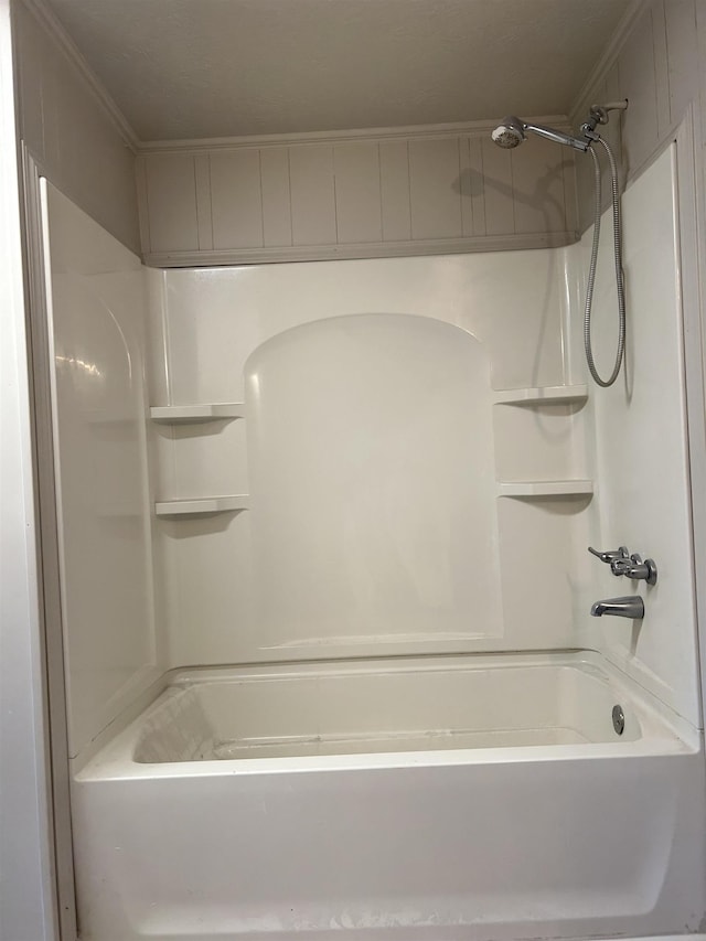 bathroom featuring washtub / shower combination