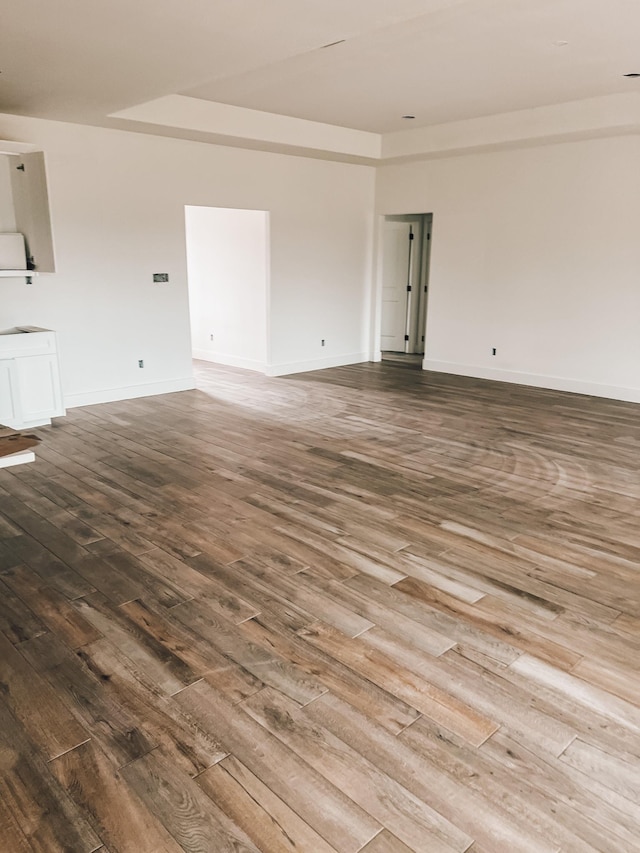 unfurnished room featuring hardwood / wood-style floors