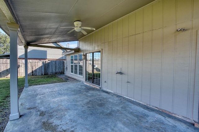 view of patio featuring ceiling fan