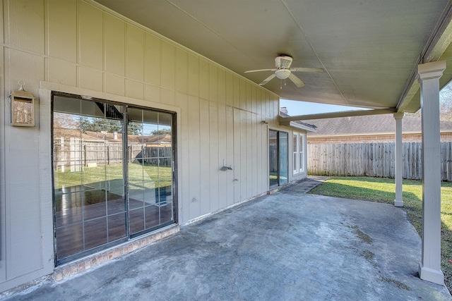 view of patio featuring ceiling fan