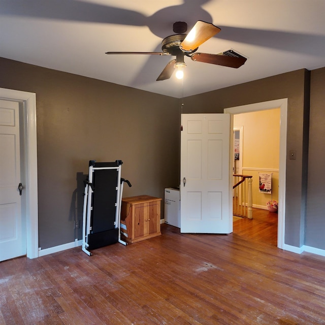 unfurnished bedroom with hardwood / wood-style flooring and ceiling fan