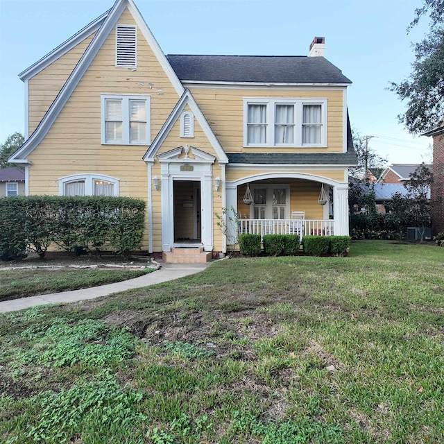 view of front of house featuring a front lawn and a porch