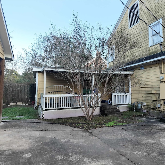 exterior space featuring covered porch