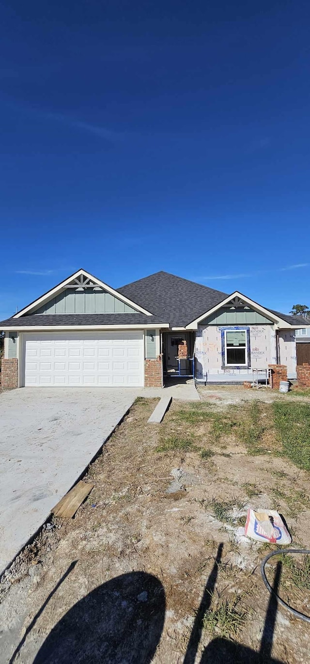 ranch-style home with a garage