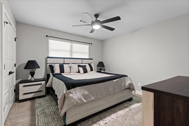 13370 Capital Dr, Bevil Oaks, TX 77713 - bedroom with carpet floors, ceiling fan, and baseboards