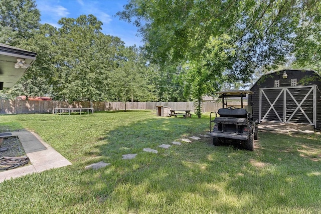 13370 Capital Dr, Bevil Oaks, TX 77713 - view of yard featuring an outdoor structure and a storage shed