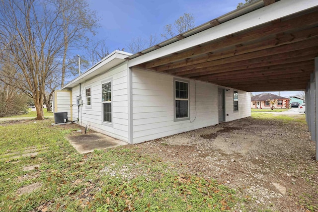 view of property exterior featuring central AC