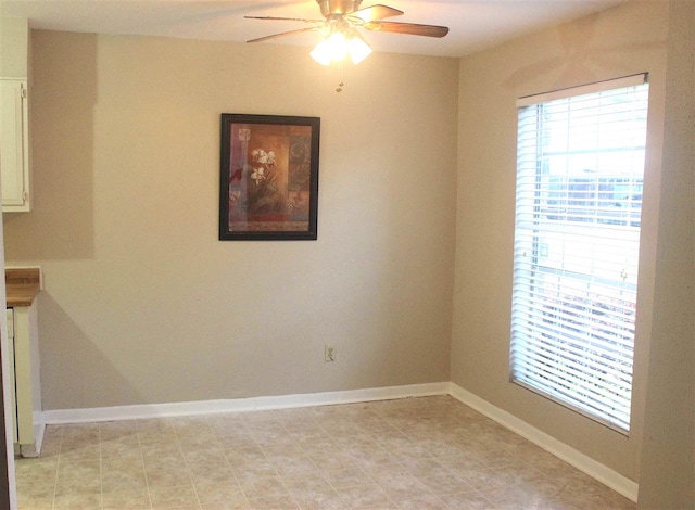 8642 Glen Meadow Ln, Beaumont, TX 77706 - spare room featuring baseboards and a ceiling fan