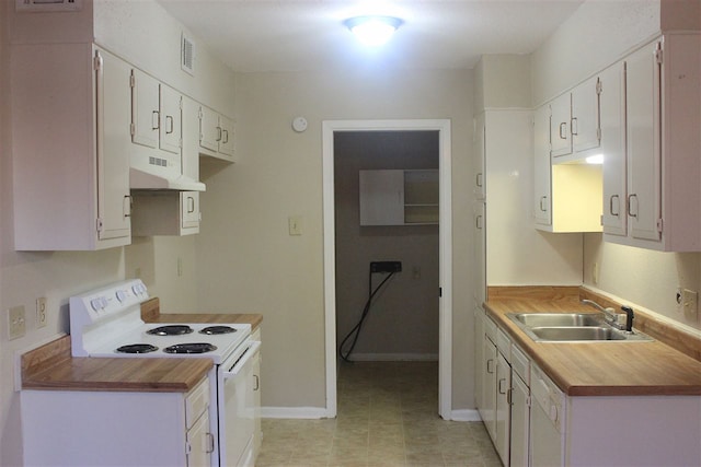 8642 Glen Meadow Ln, Beaumont, TX 77706 - kitchen featuring white cabinets, under cabinet range hood, visible vents, a sink, and electric range