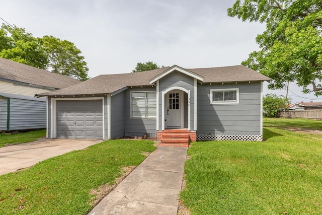view of front of property featuring a shingled roof, an attached garage, and driveway