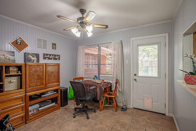 tiled office space with ceiling fan and crown molding