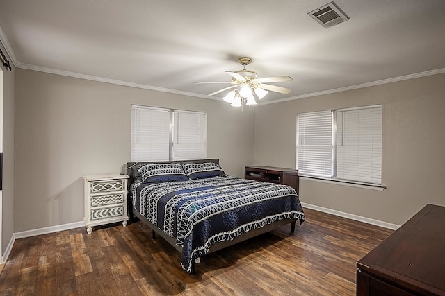 bedroom featuring dark hardwood / wood-style floors, ceiling fan, and ornamental molding