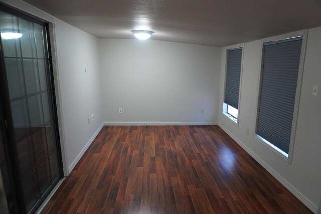 bedroom featuring ceiling fan and dark hardwood / wood-style flooring