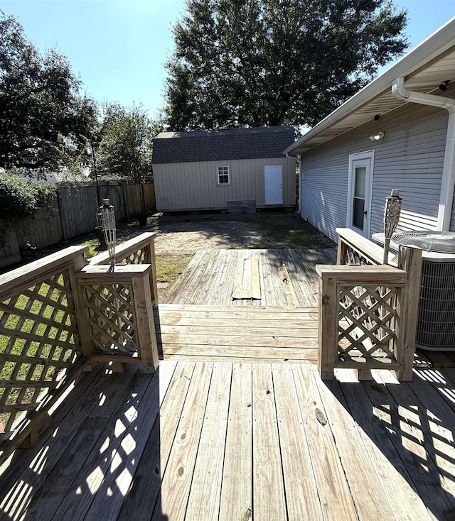 deck with cooling unit and a storage shed