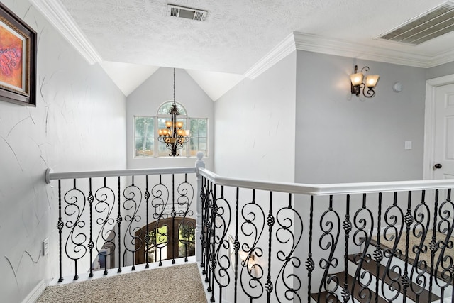 5320 Manion Way, Lumberton, TX 77657 - hallway featuring a chandelier, lofted ceiling, and crown molding