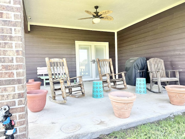 view of patio / terrace featuring ceiling fan