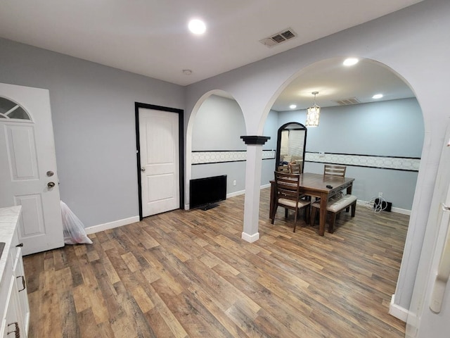 dining room with hardwood / wood-style floors