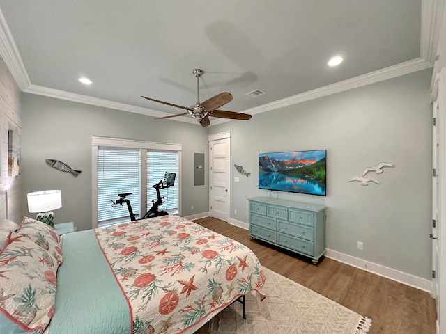 bedroom with electric panel, ceiling fan, dark hardwood / wood-style flooring, and crown molding