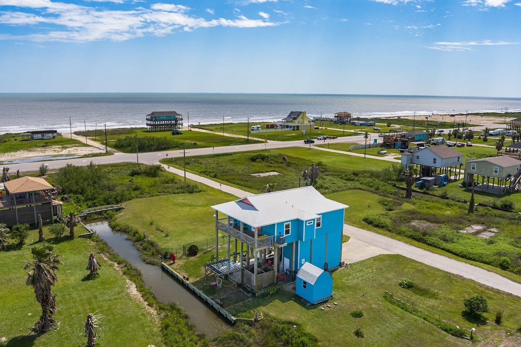 aerial view featuring a water view