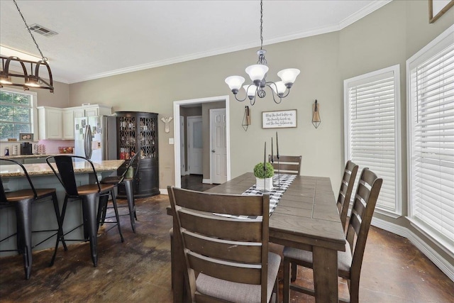 265 Callie Ln, Orange, TX 77632 - dining room featuring a chandelier, finished concrete floors, baseboards, and crown molding