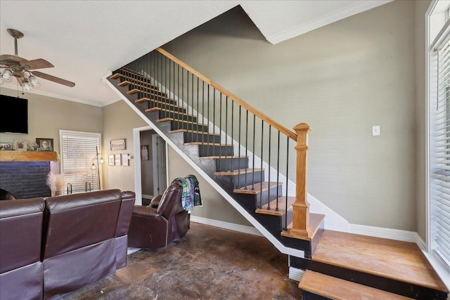 265 Callie Ln, Orange, TX 77632 - stairs with a ceiling fan, baseboards, crown molding, concrete flooring, and plenty of natural light