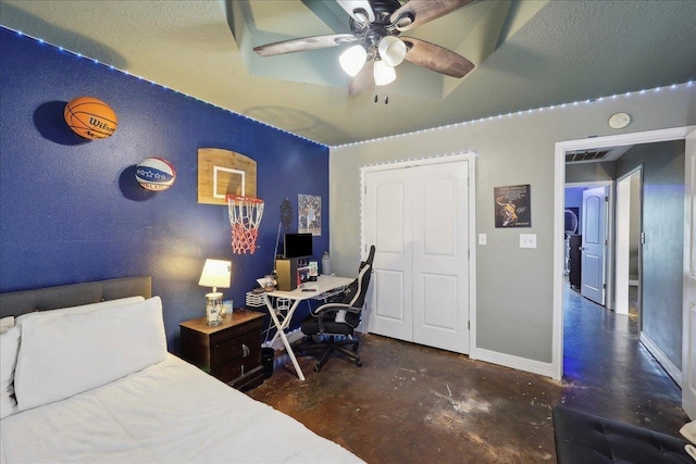 265 Callie Ln, Orange, TX 77632 - bedroom featuring unfinished concrete floors, baseboards, an office area, and a ceiling fan