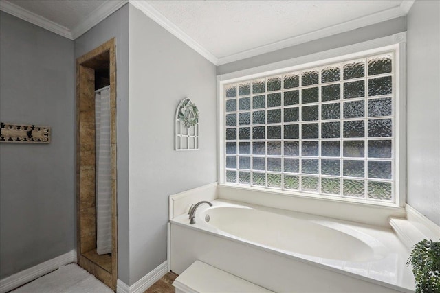 265 Callie Ln, Orange, TX 77632 - bathroom with a garden tub, ornamental molding, a tile shower, and baseboards