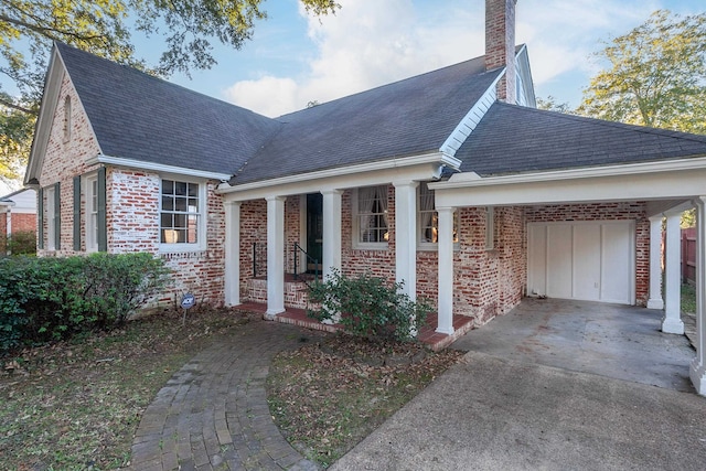 view of front facade featuring a carport