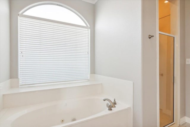 bathroom with independent shower and bath