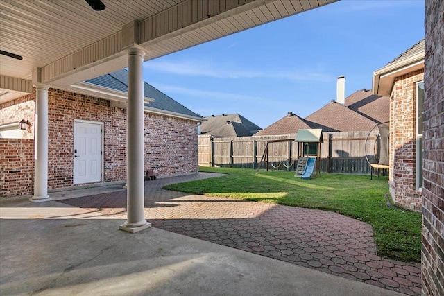 view of patio with a playground