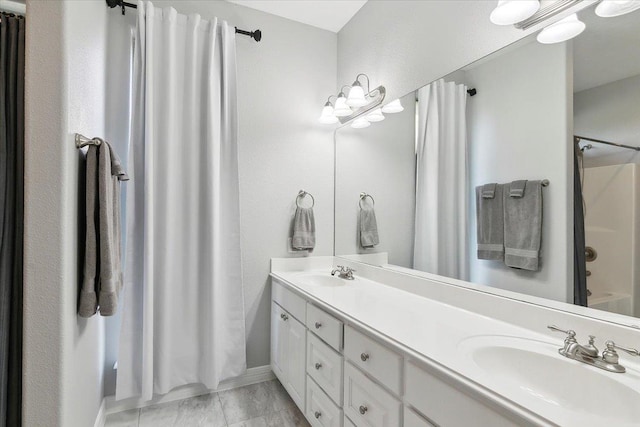 bathroom with vanity and shower / bath combination with curtain