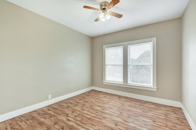 3500 32nd St, Port Arthur, TX 77642 - spare room featuring wood finished floors and a ceiling fan