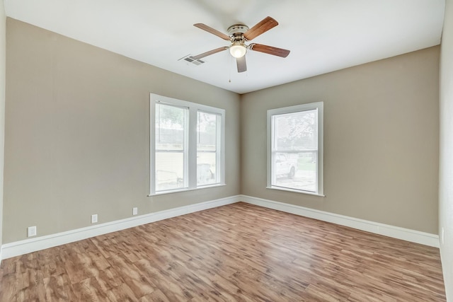 3500 32nd St, Port Arthur, TX 77642 - spare room featuring wood finished floors and ceiling fan